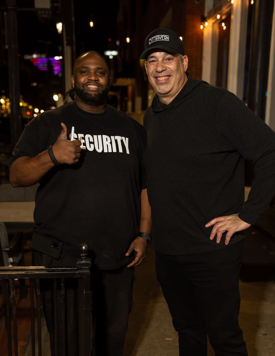 Event Experts security team member in a SECURITY shirt giving a thumbs up